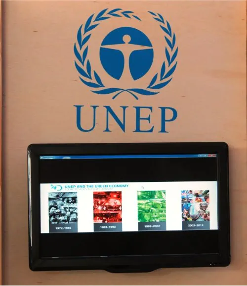 Monitor em estande da ONU, Parque dos Atletas